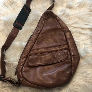 Ameribag brown leather sling bag
Unisex